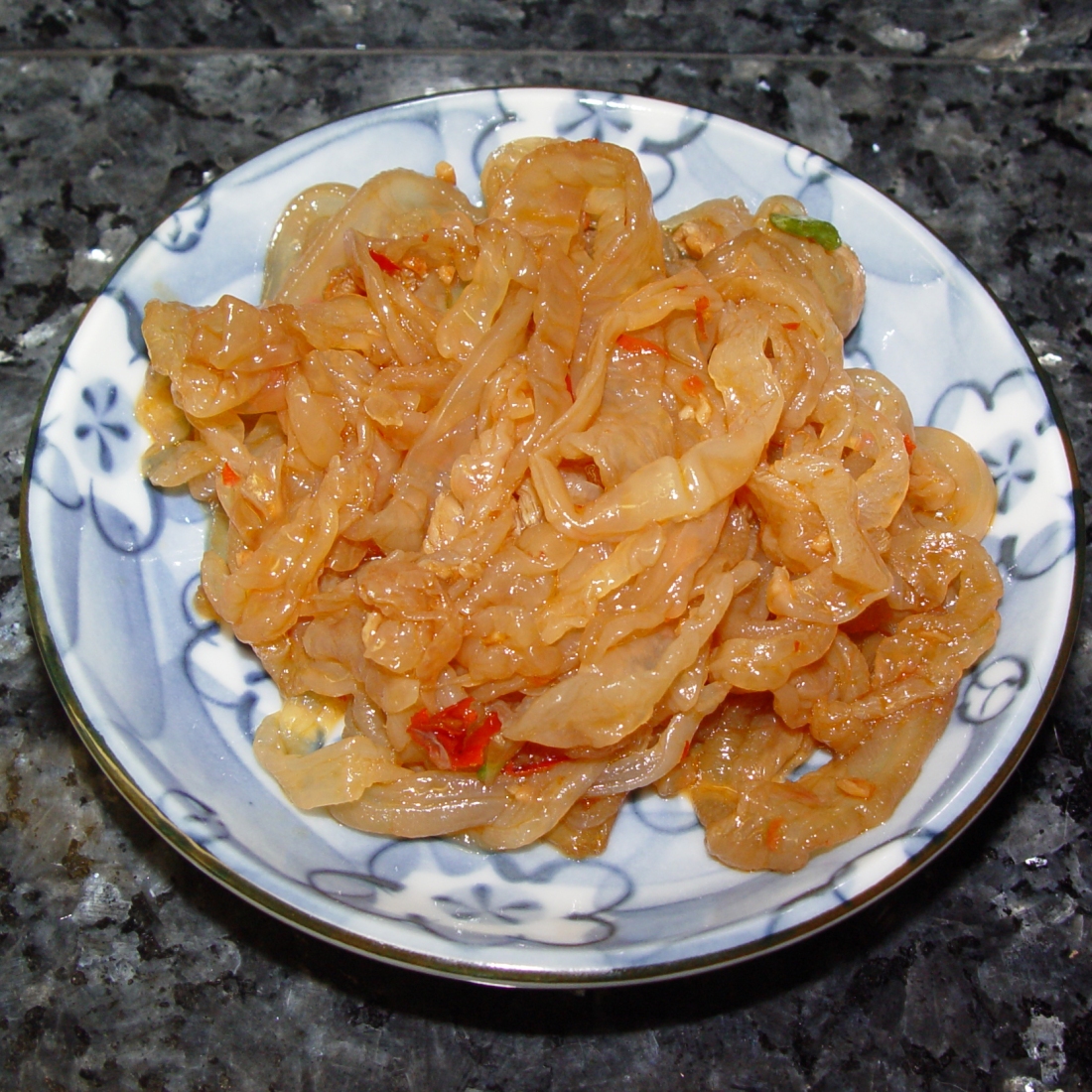 Source: https://en.wikipedia.org/wiki/File:Jellyfish_sesame_oil_and_chili_sauce.jpg By: Howcheng https://commons.wikimedia.org/wiki/User:Howcheng